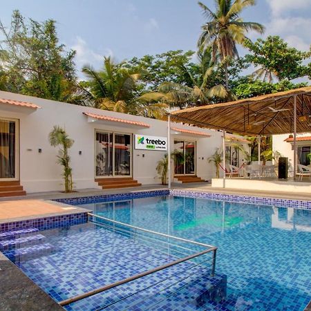 Treebo Code Red Hotel มอร์จิม ภายนอก รูปภาพ